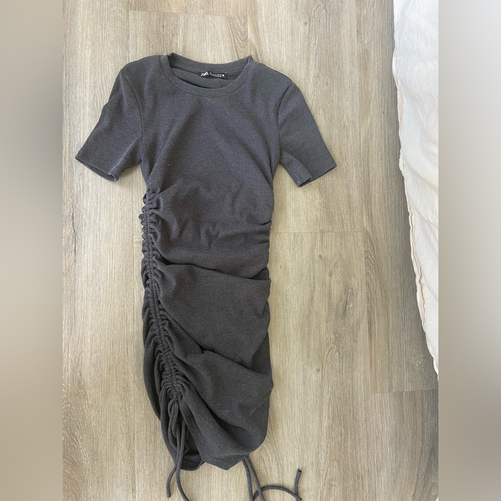 Gray bodycon dress with ties on sides. So flattering!